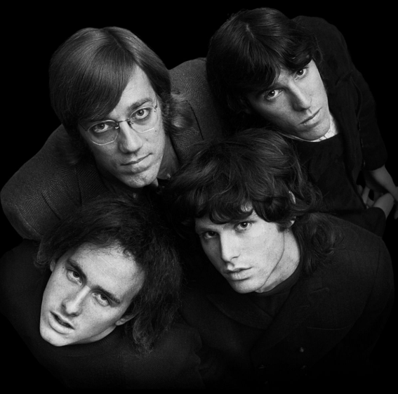 Black-and-white overhead portrait of the four members of The Doors